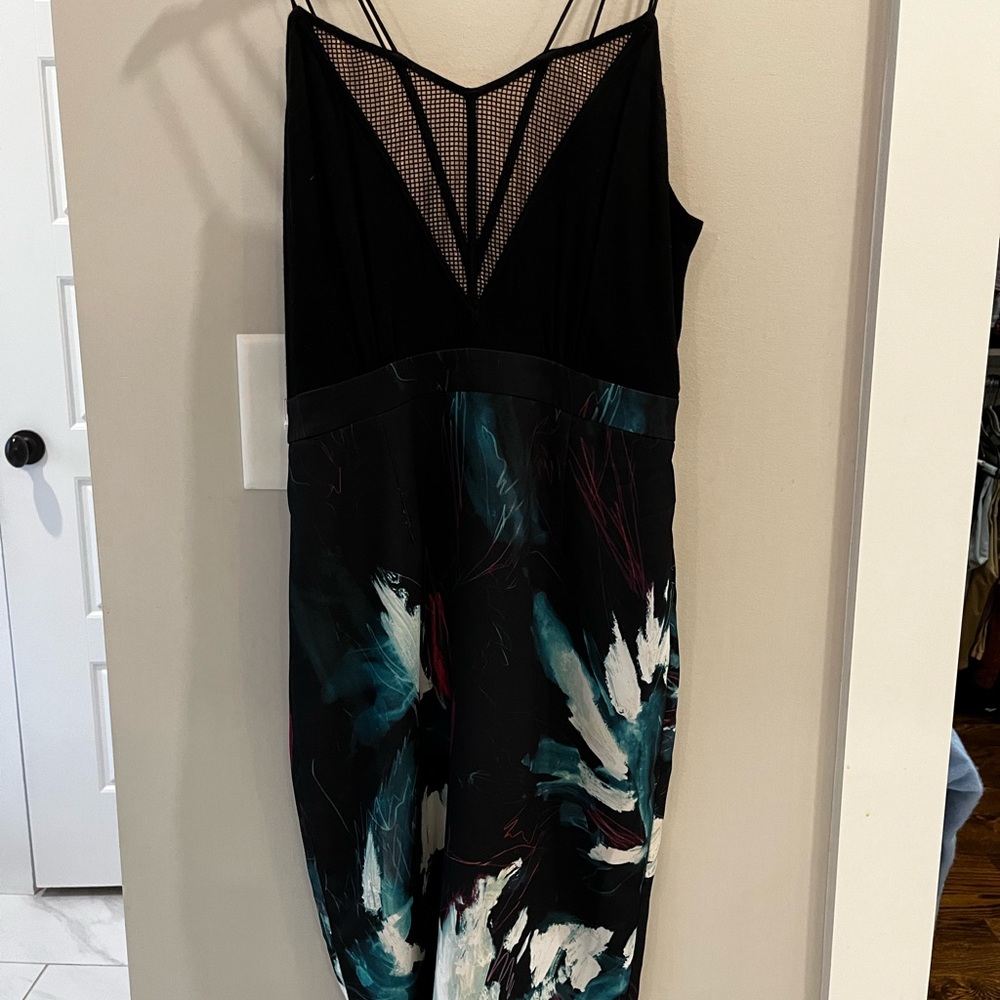 Chelsea 28 cocktail dress. Super fun print and detailed top!